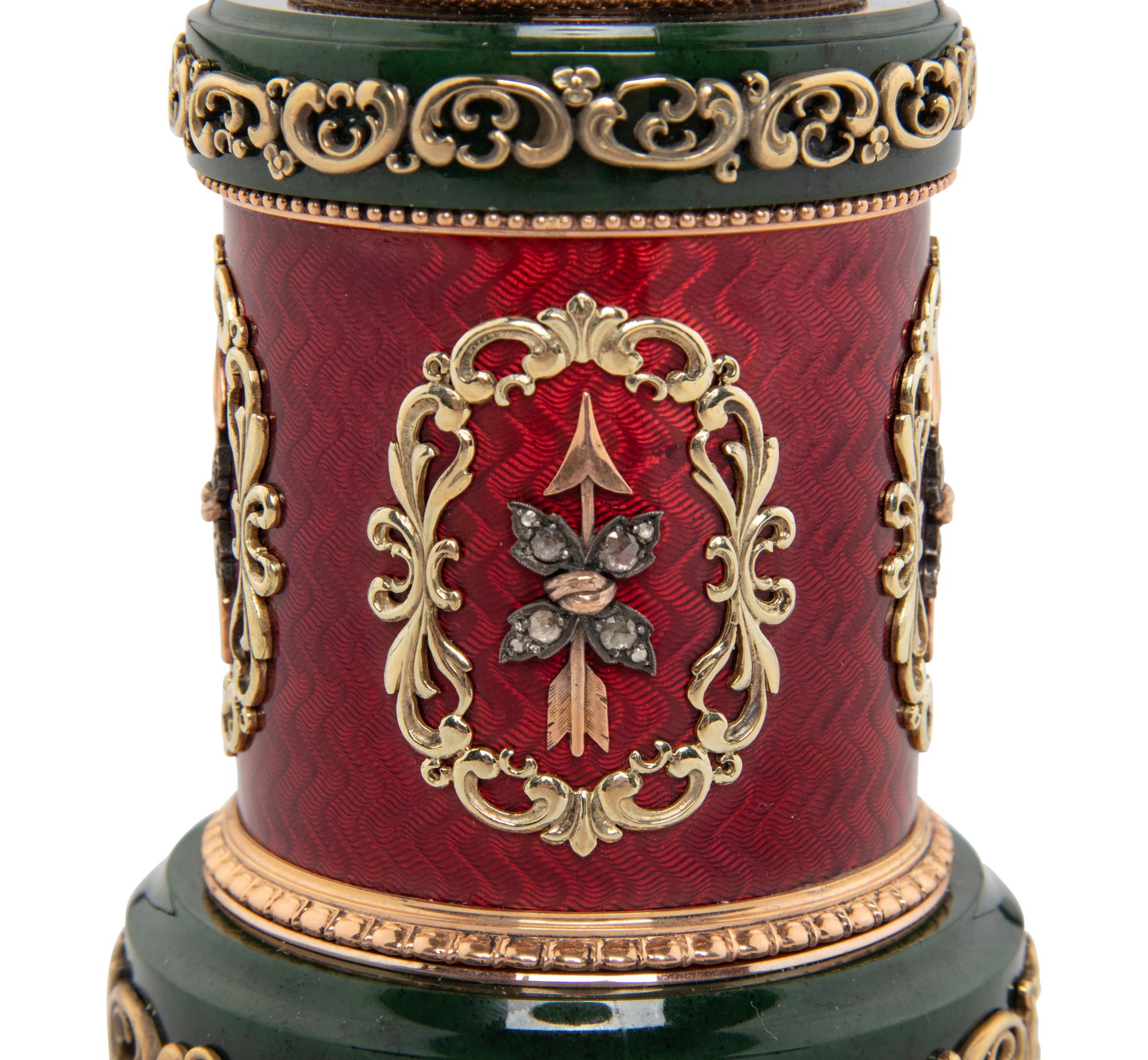 A Gold, Enamel and Gemstone-Mounted Nephrite Surprise Egg