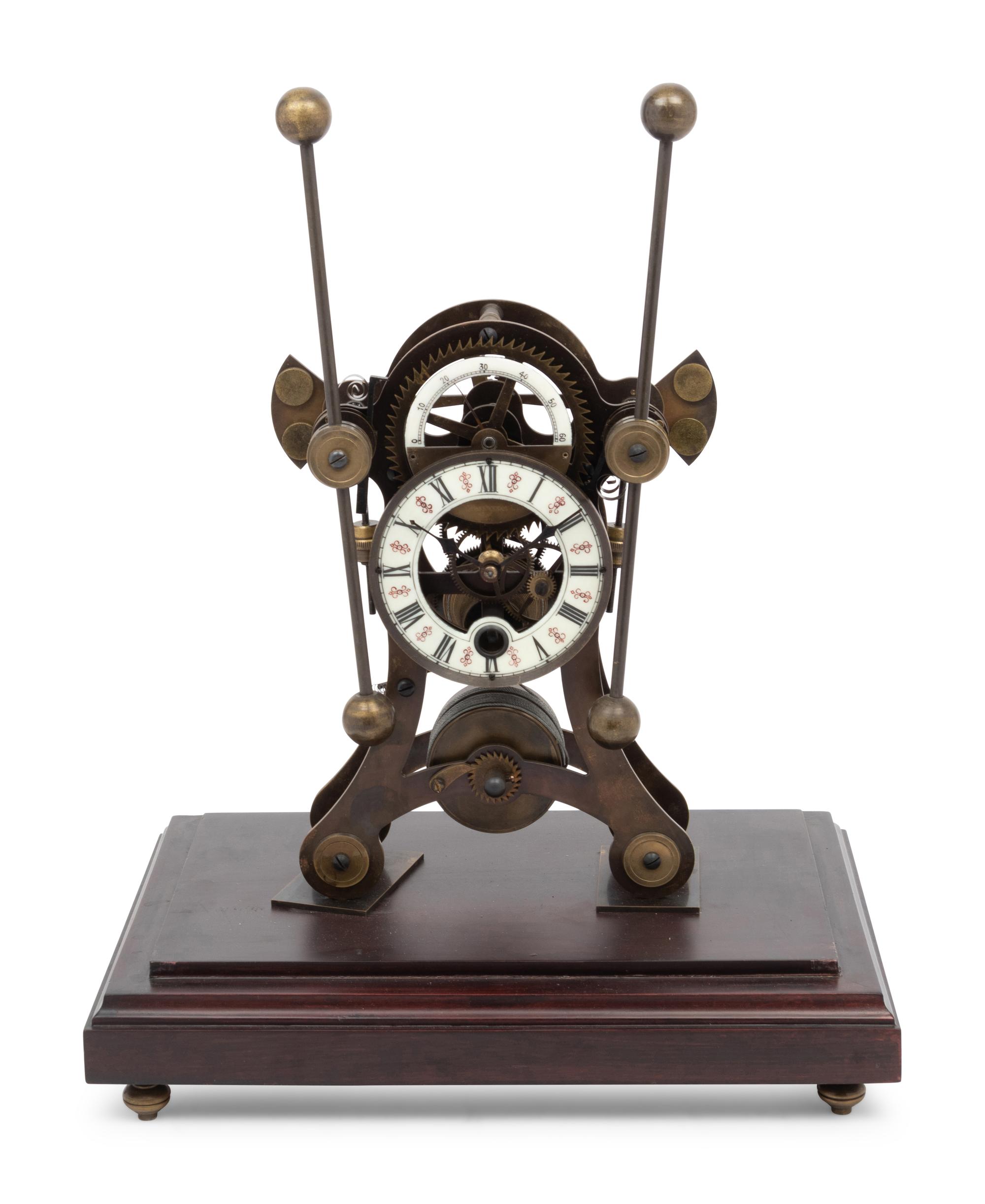 A Continental Cased Brass Skeleton Clock
