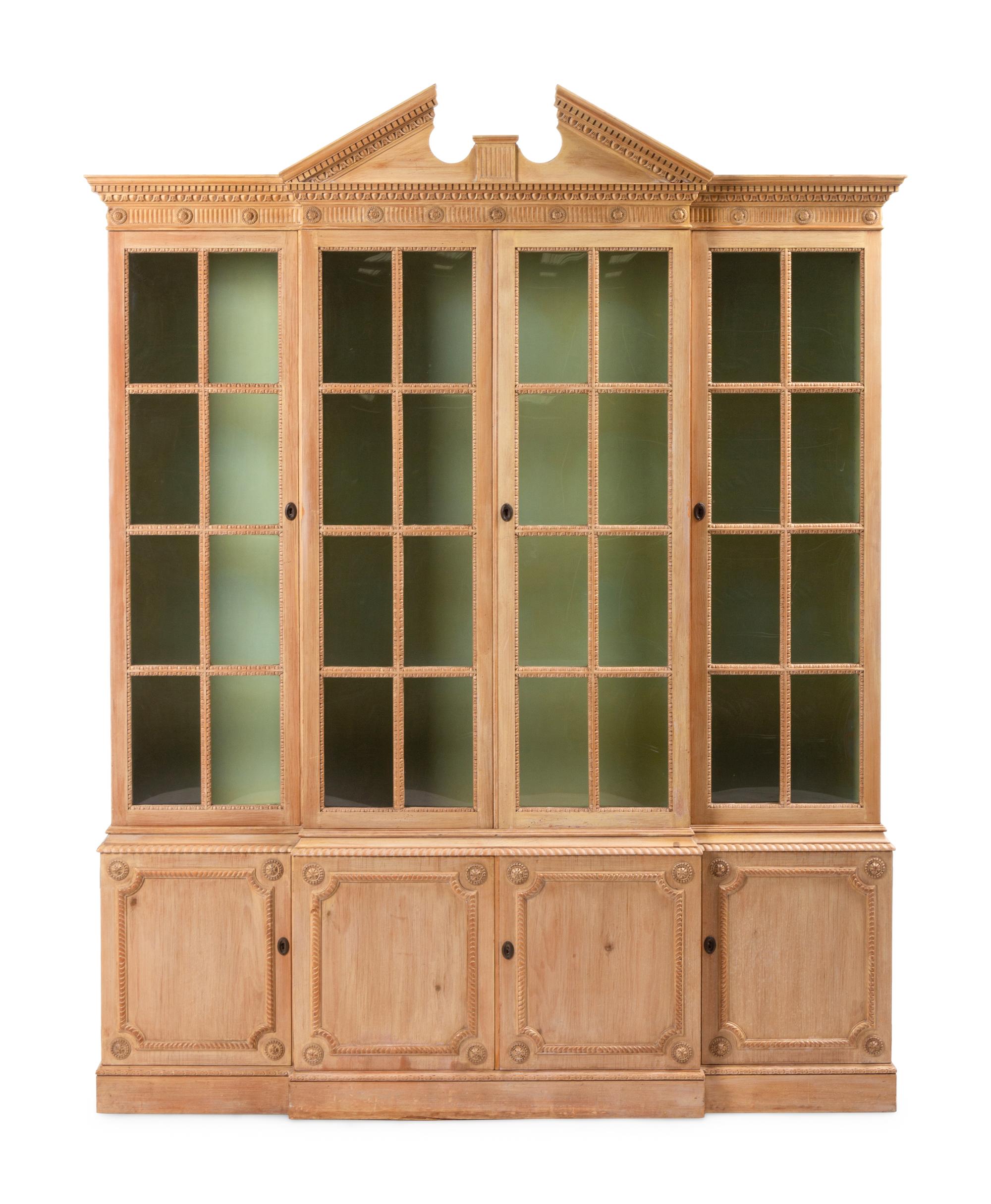 A George III Style Carved Pine Breakfront Bookcase