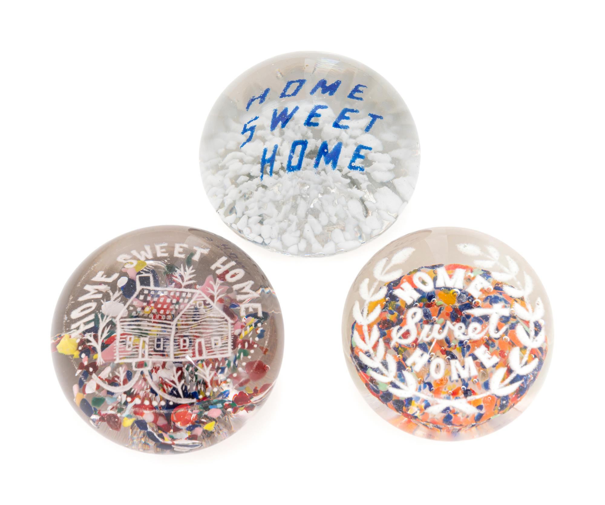 Three American Frit Home Sweet Home Motto Over Speckled Ground Glass Paperweights