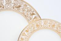 A Wedgwood Gold Florentine Porcelain Dinner Service