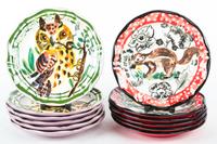 Twelve Ceramic Plates Diameter 10 inches.