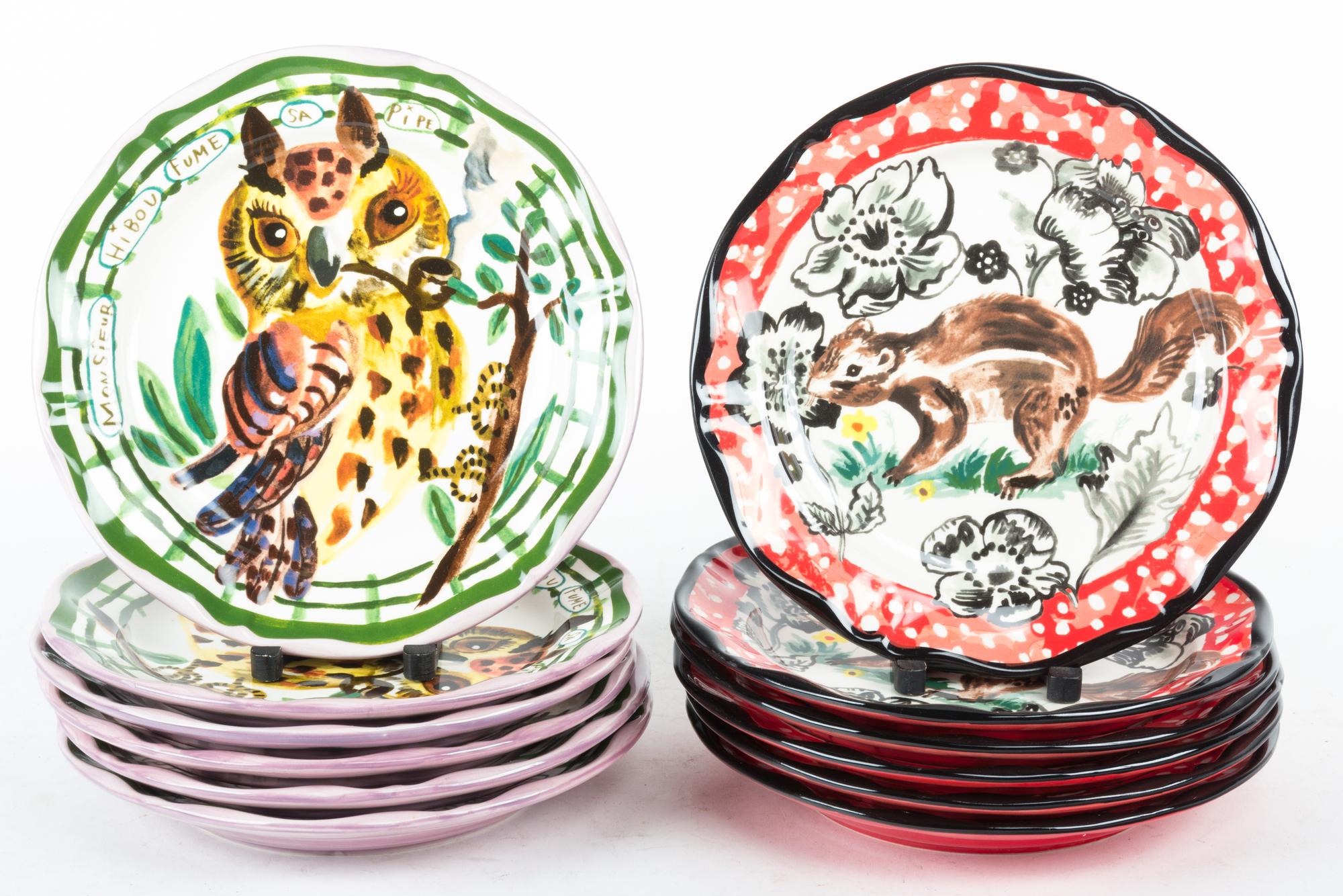Twelve Ceramic Plates Diameter 10 inches.