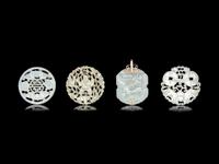 Four Chinese Jade and Serpentine Pendants