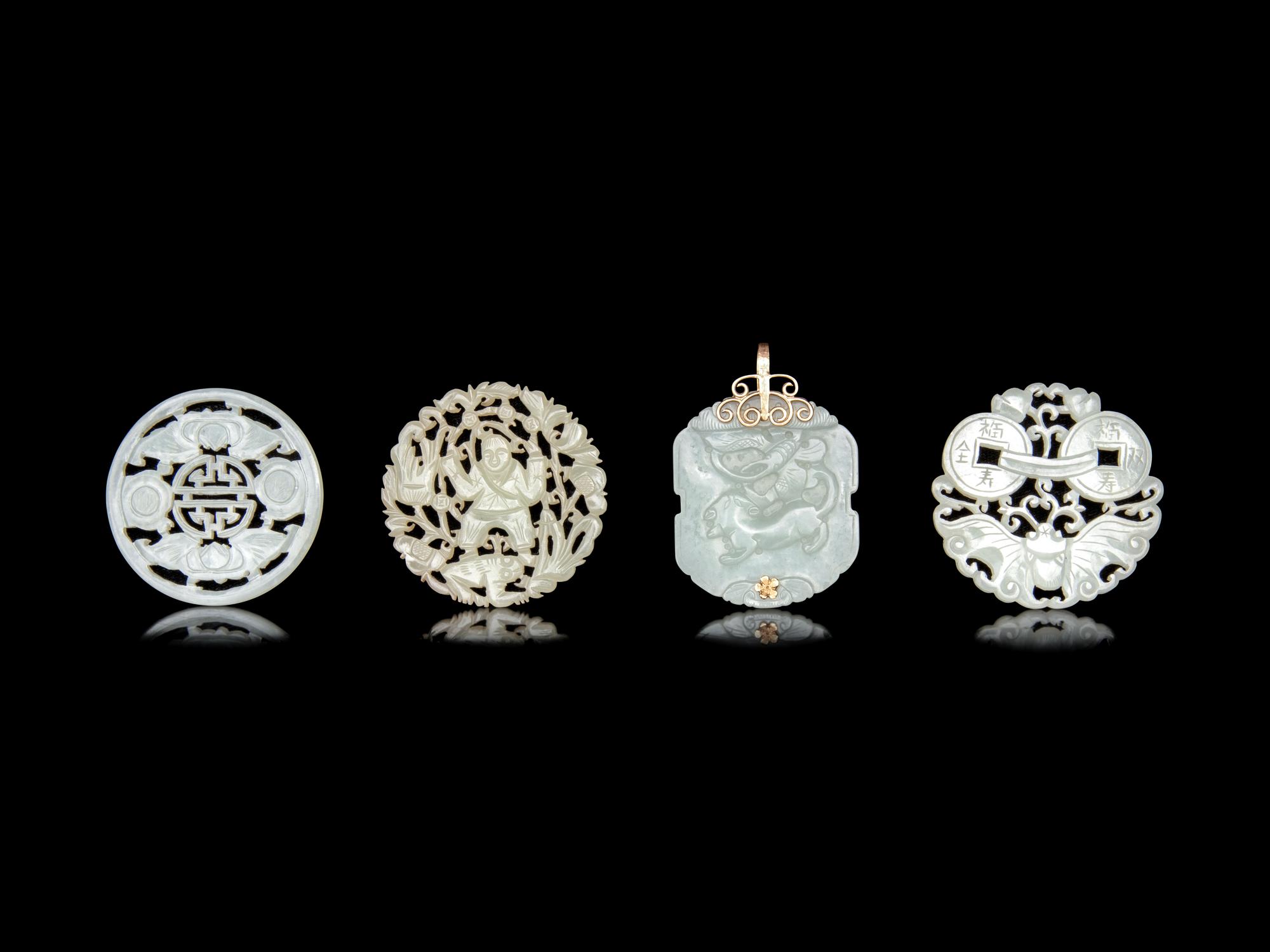 Four Chinese Jade and Serpentine Pendants