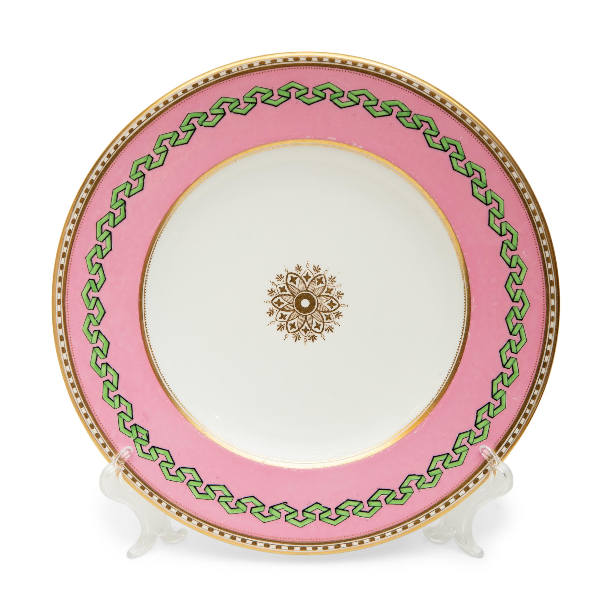 A Set of Thirteen Pink and Green Painted Porcelain Luncheon Plates