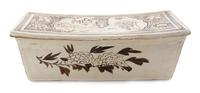 A Cizhou Stoneware Pillow Length 15 3/4 inches.