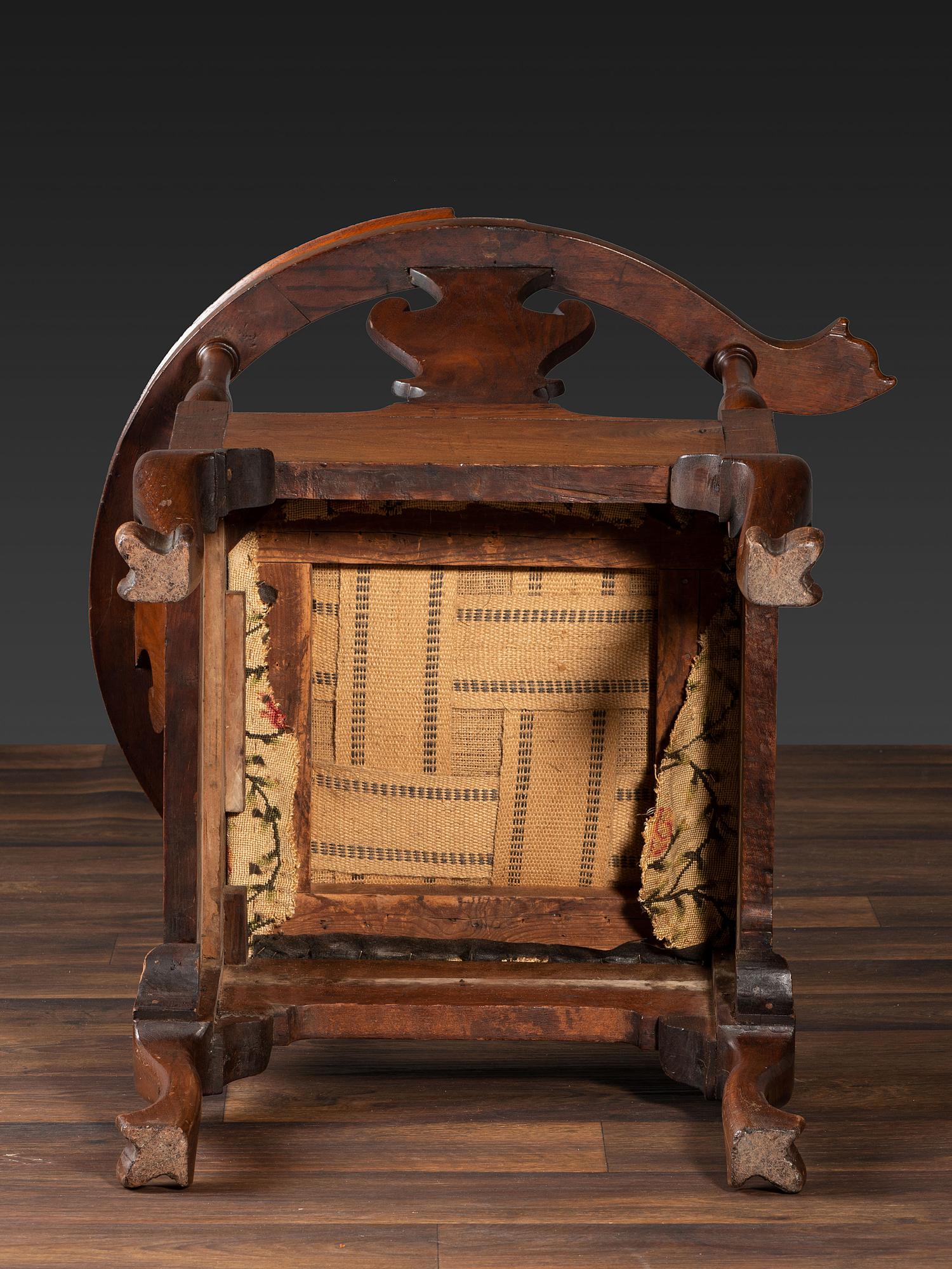 A Queen Anne Carved Walnut Knuckle-Arm and Trifid Foot Corner Chair