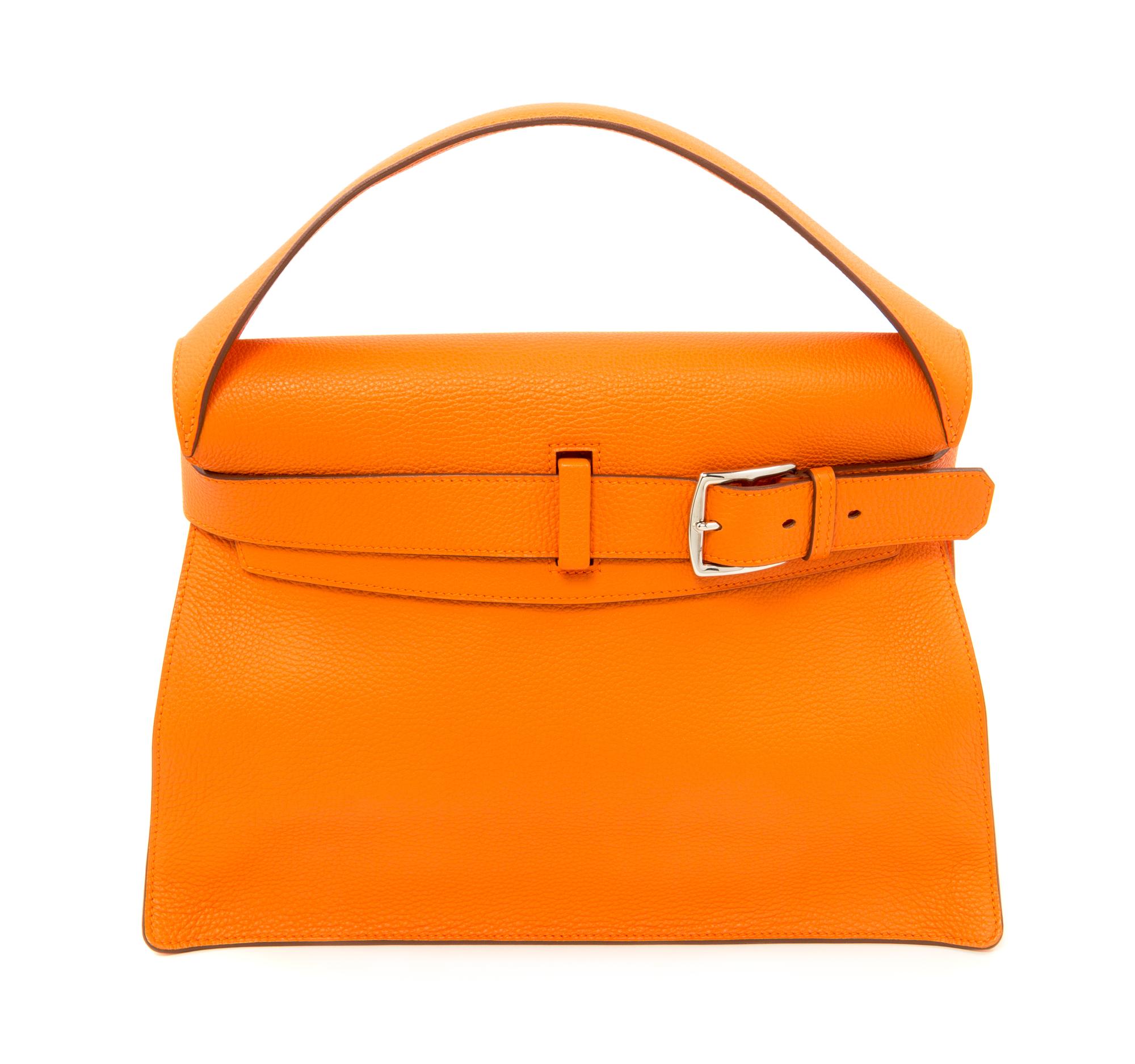 An Hermès Orange Togo Etribelt Handbag, 13.5" x 10.5" x 5"; Handle drop: 3.5".