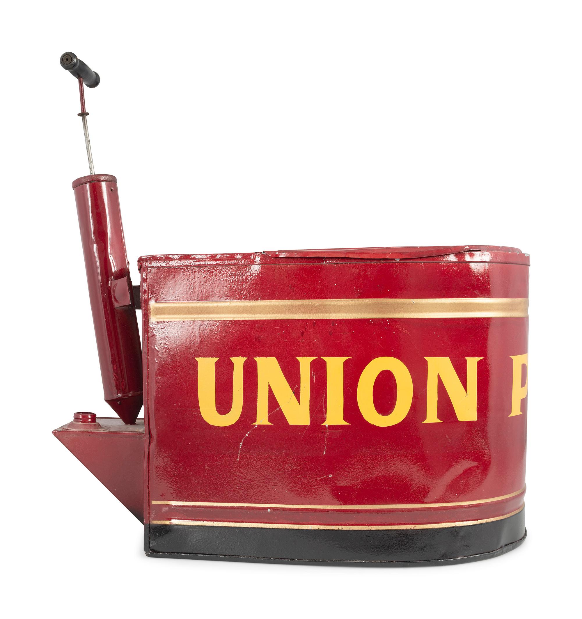 A Painted Tin Pump Operated Vessel