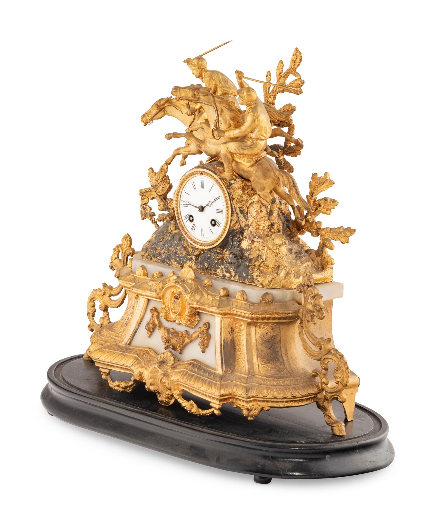 A French Gilt Metal and Alabaster Mantel Clock