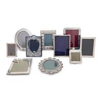 A Collection of Twenty Silver Picture Frames