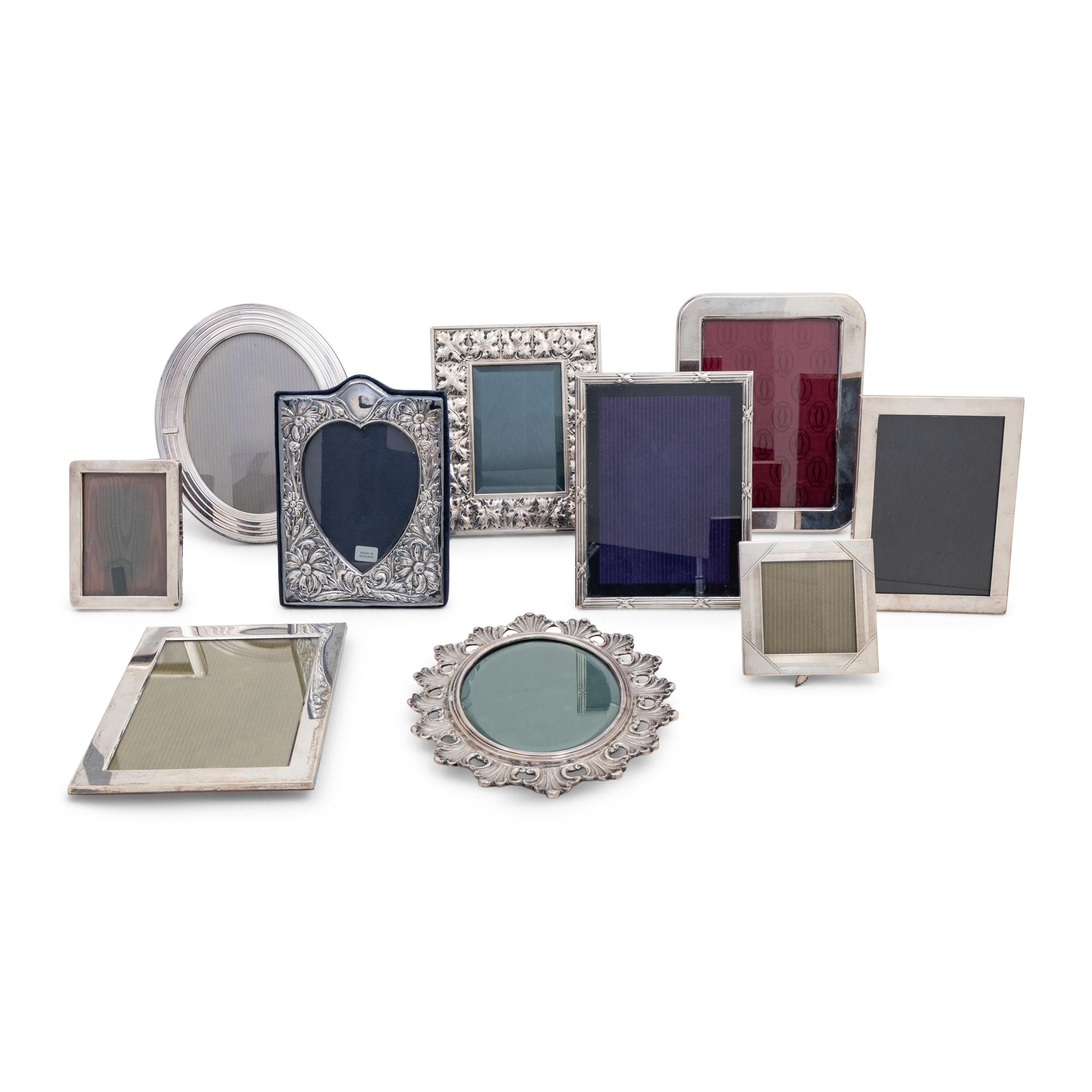 A Collection of Twenty Silver Picture Frames
