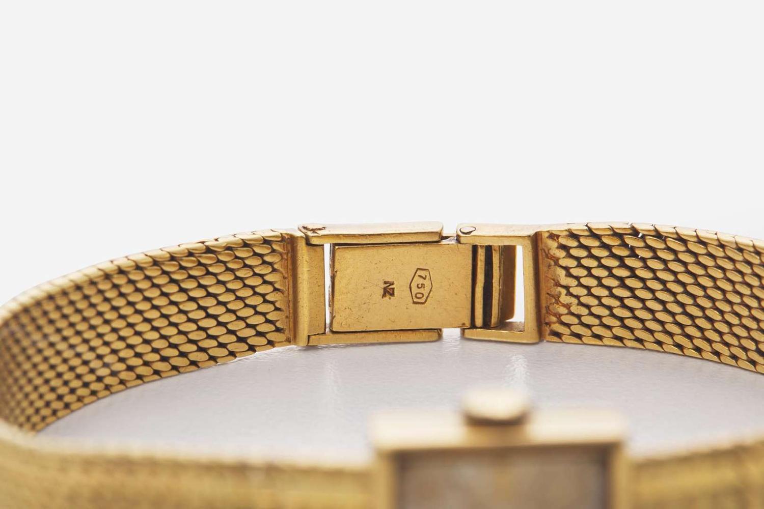 An 18K Yellow Gold Ladies Juvenia Bracelet Watch
