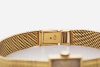 An 18K Yellow Gold Ladies Juvenia Bracelet Watch