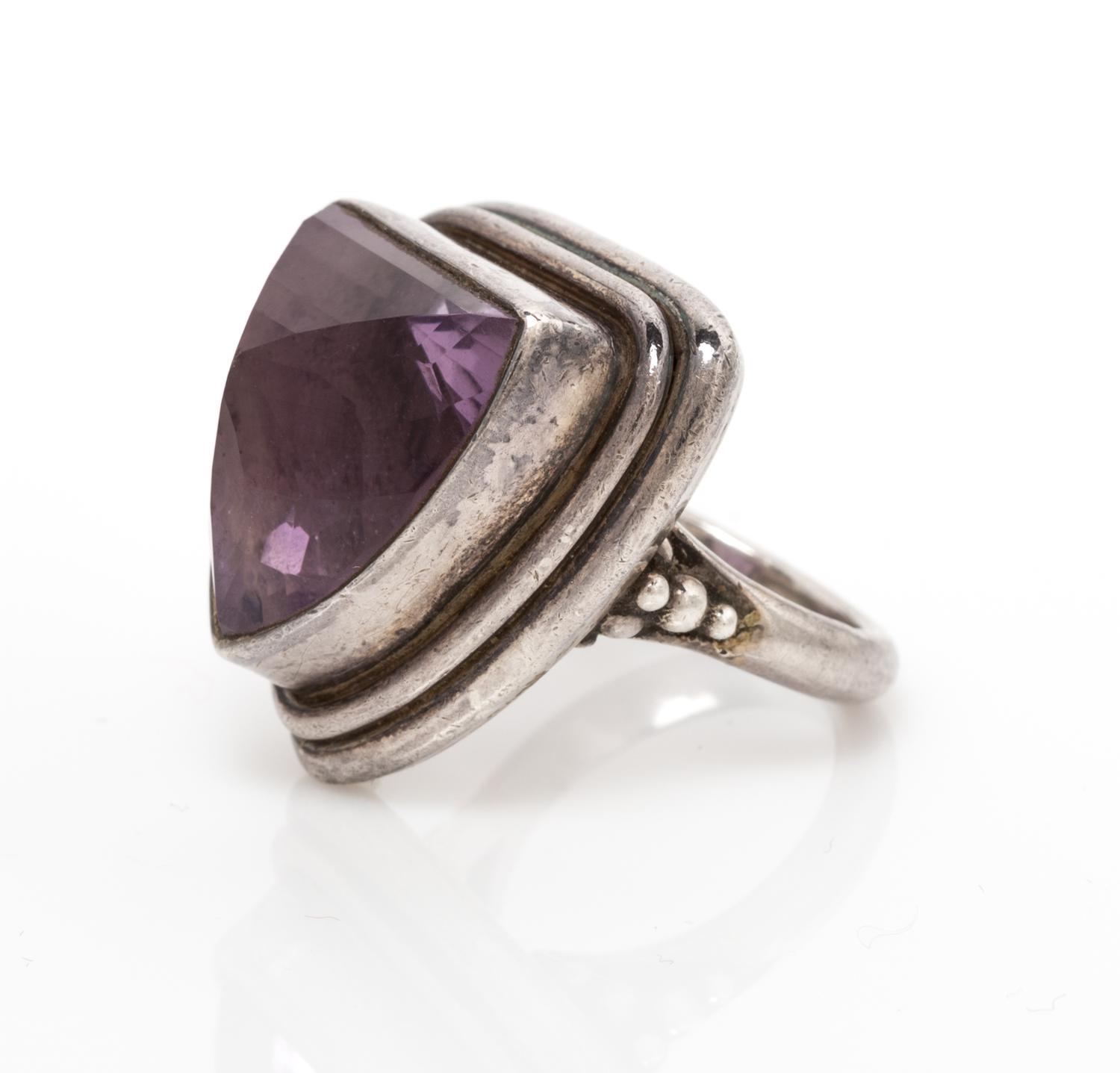 A Silver and Amethyst Ring, 12.20 dwts.