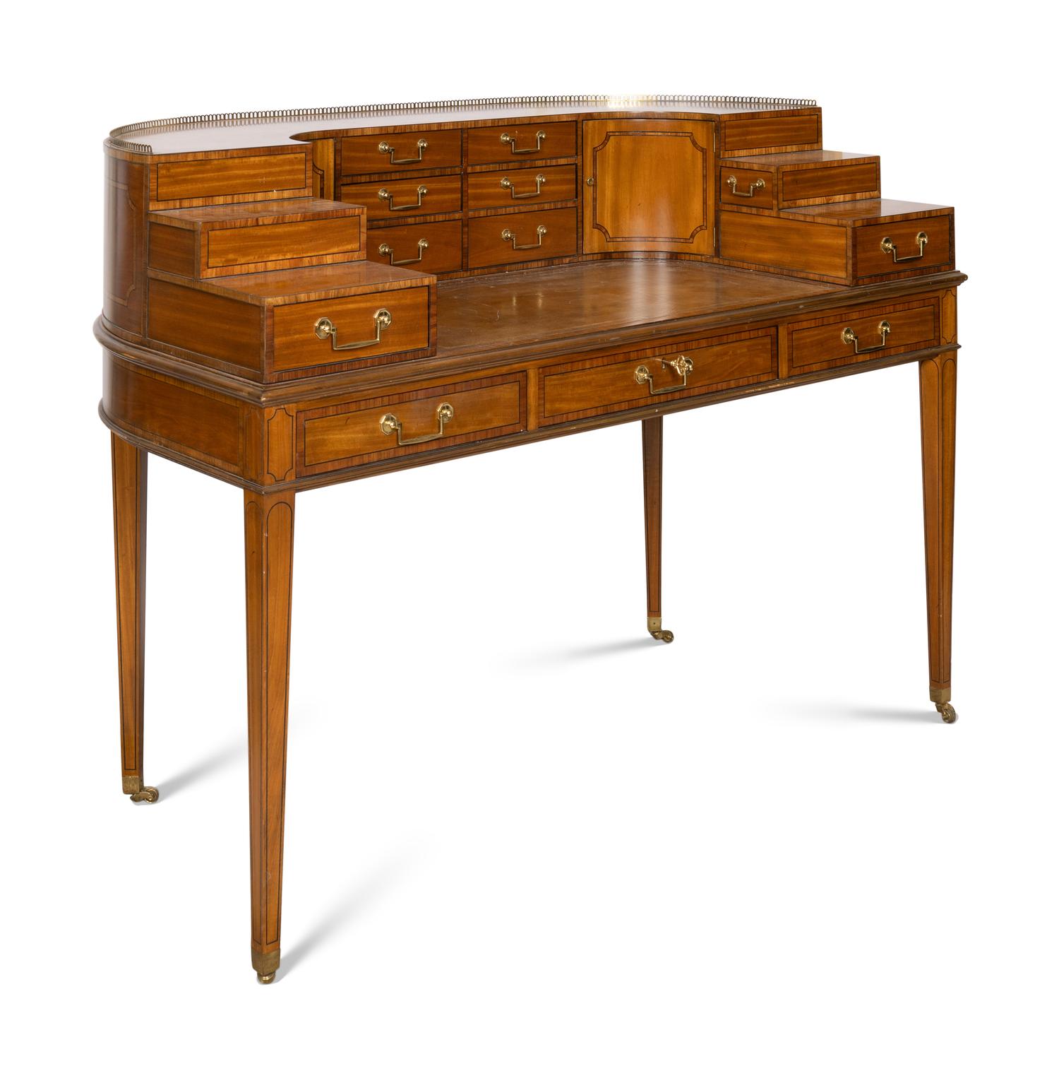 A Baker Satinwood and Rosewood 1765 Carlton House Desk