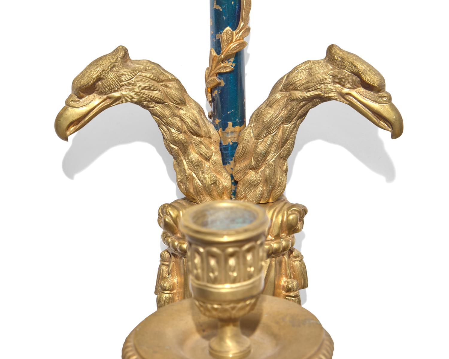 A set of four Continental Neoclassical blue enameled and gilt-bronze wall sconces, probably 19th century
