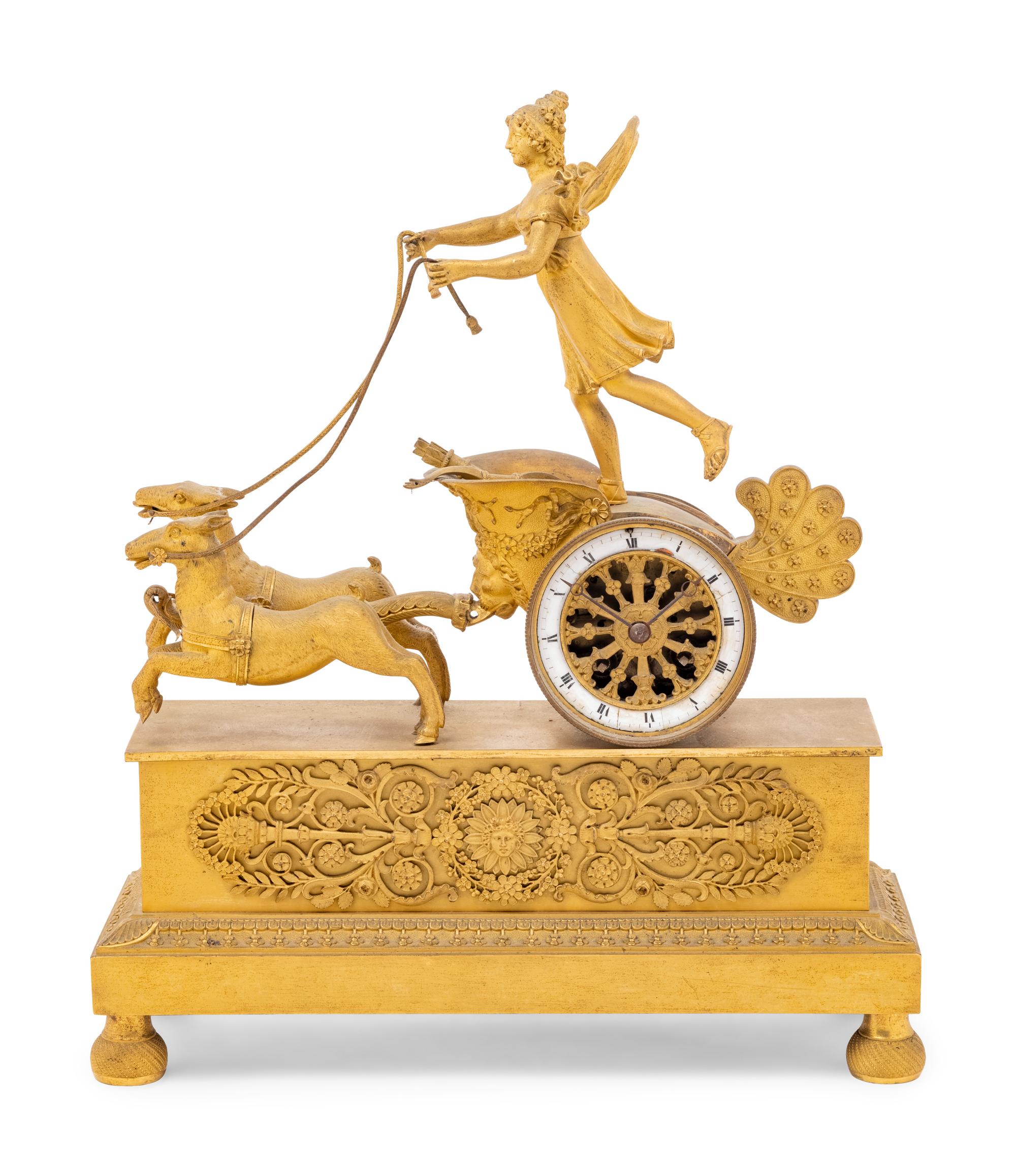 An Empire Style Gilt Bronze Figural Clock