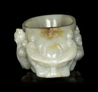 A Chinese Celadon Jade ' Chilong' Brush Washer