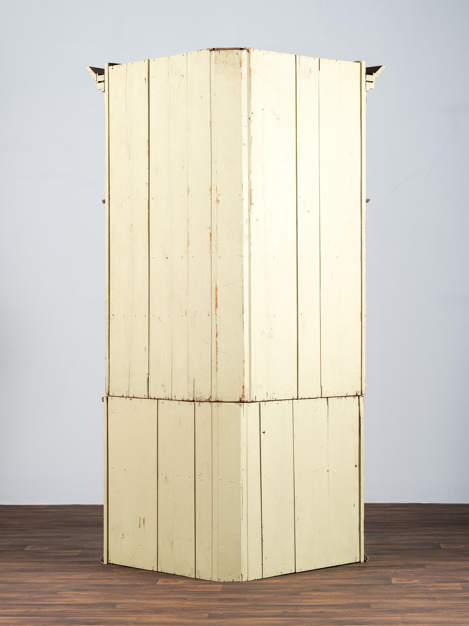 A Chippendale Carved and Stained Pine Corner Cupboard