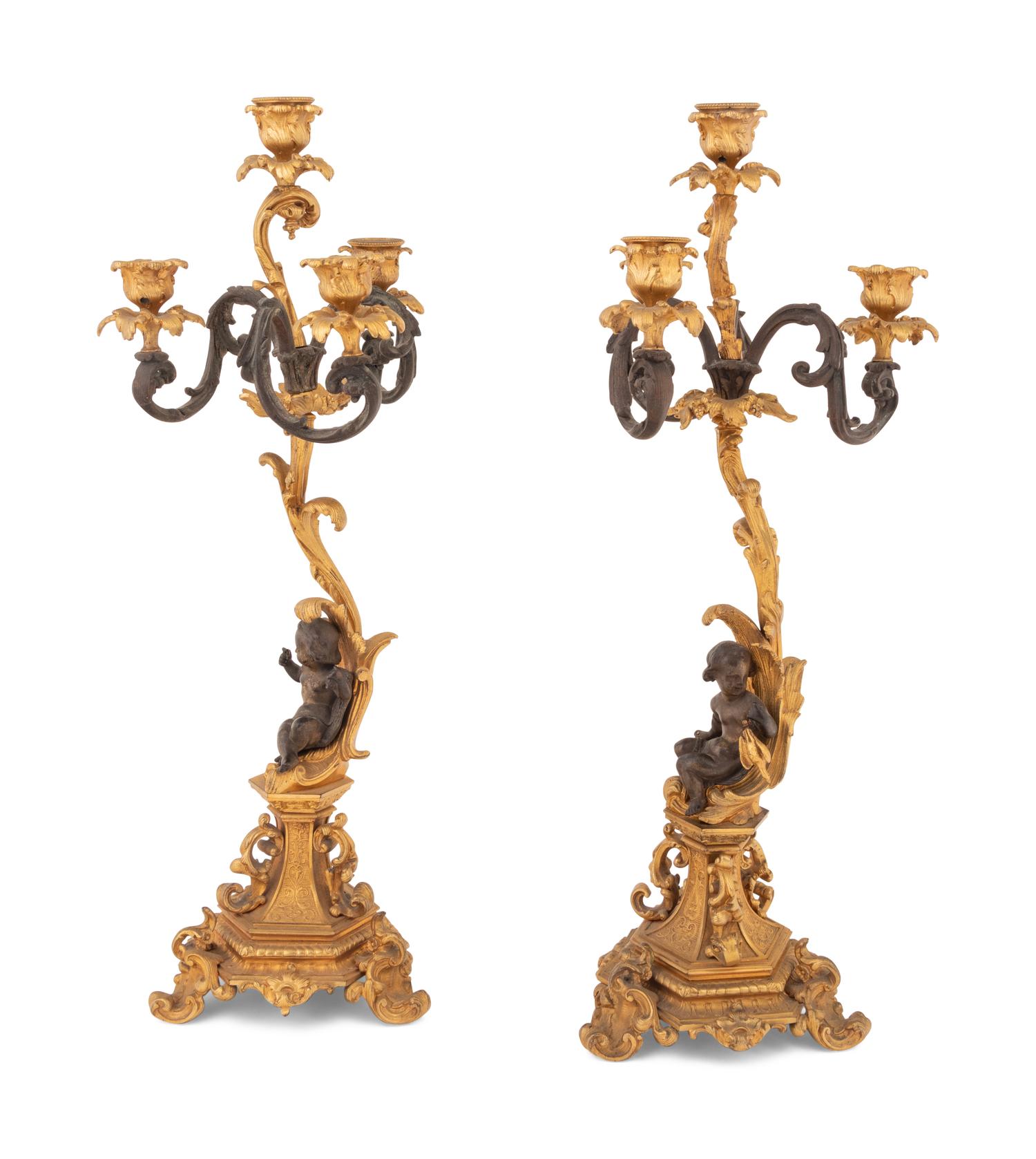 A Pair of Continental Gilt and Patinated Bronze Four-Light Candelabra