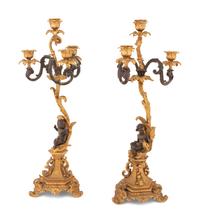 A Pair of Continental Gilt and Patinated Bronze Four-Light Candelabra