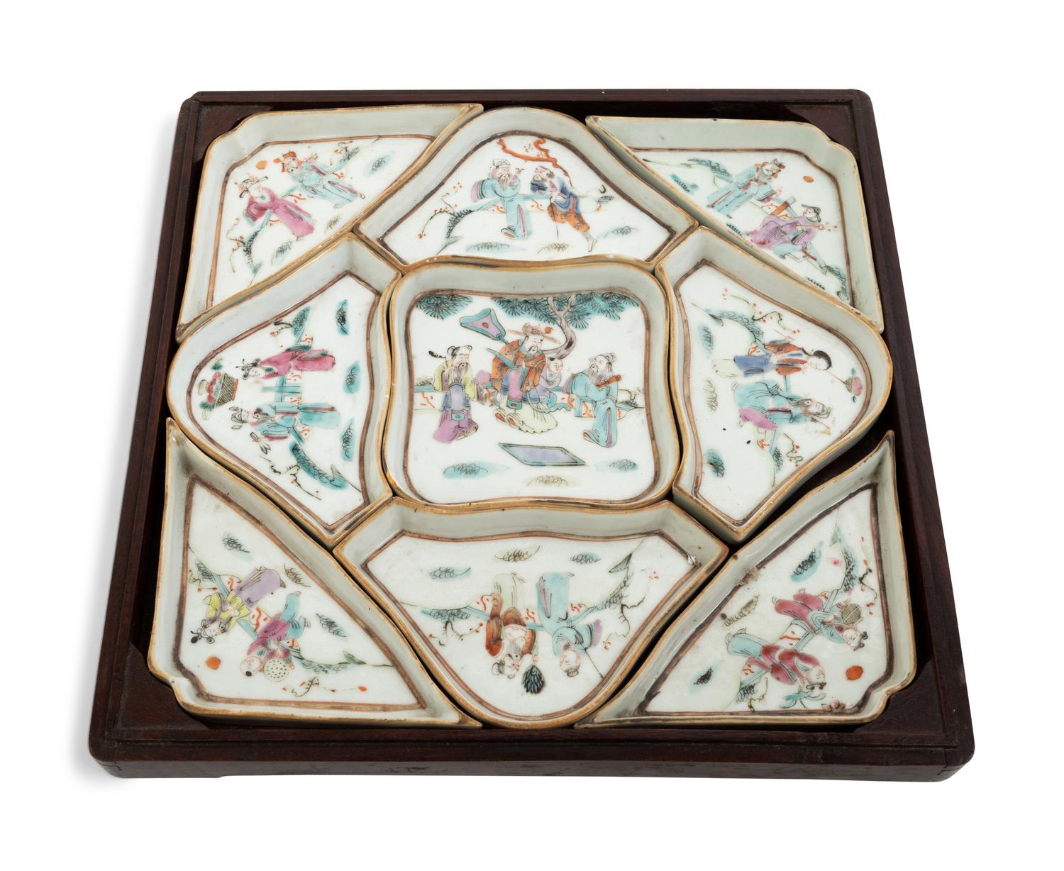 A Chinese Nine-Piece Famille Rose 'Lady' Porcelain Sweet Meat Set