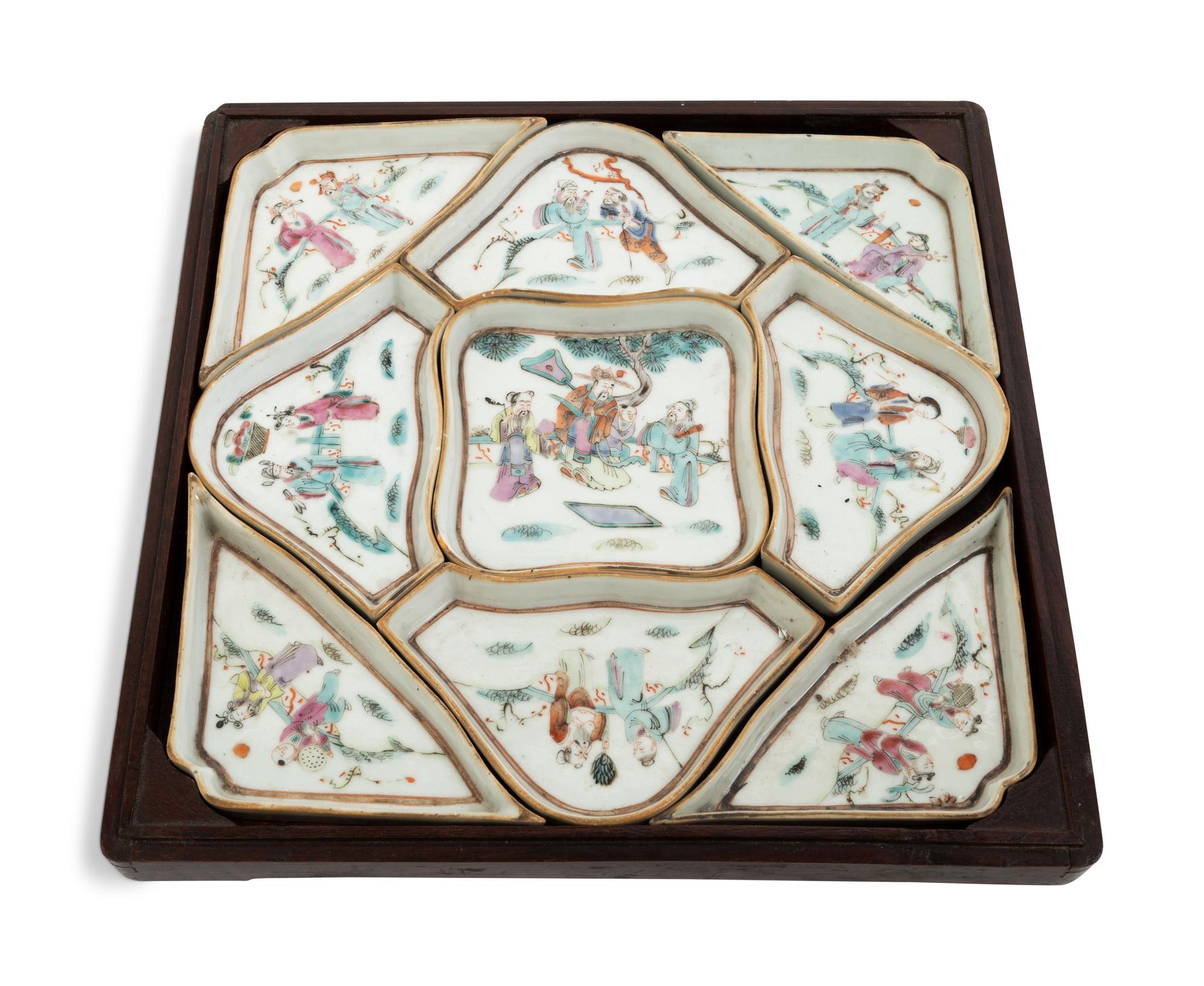 A Chinese Nine-Piece Famille Rose 'Lady' Porcelain Sweet Meat Set