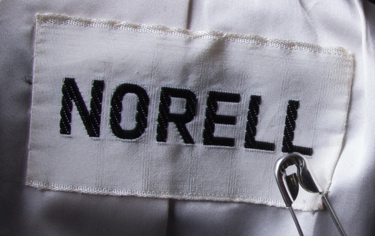 A Norell Black Wool Skirt Suit,