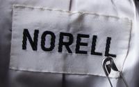 A Norell Black Wool Skirt Suit,
