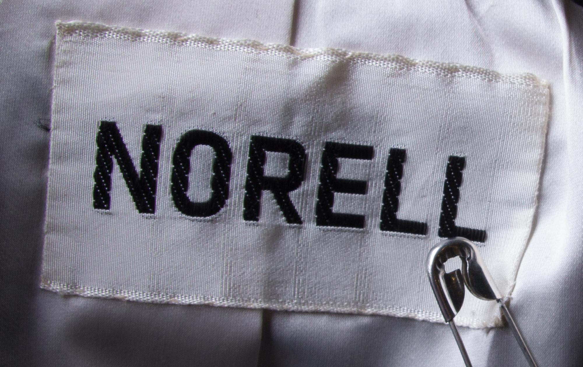 A Norell Black Wool Skirt Suit,