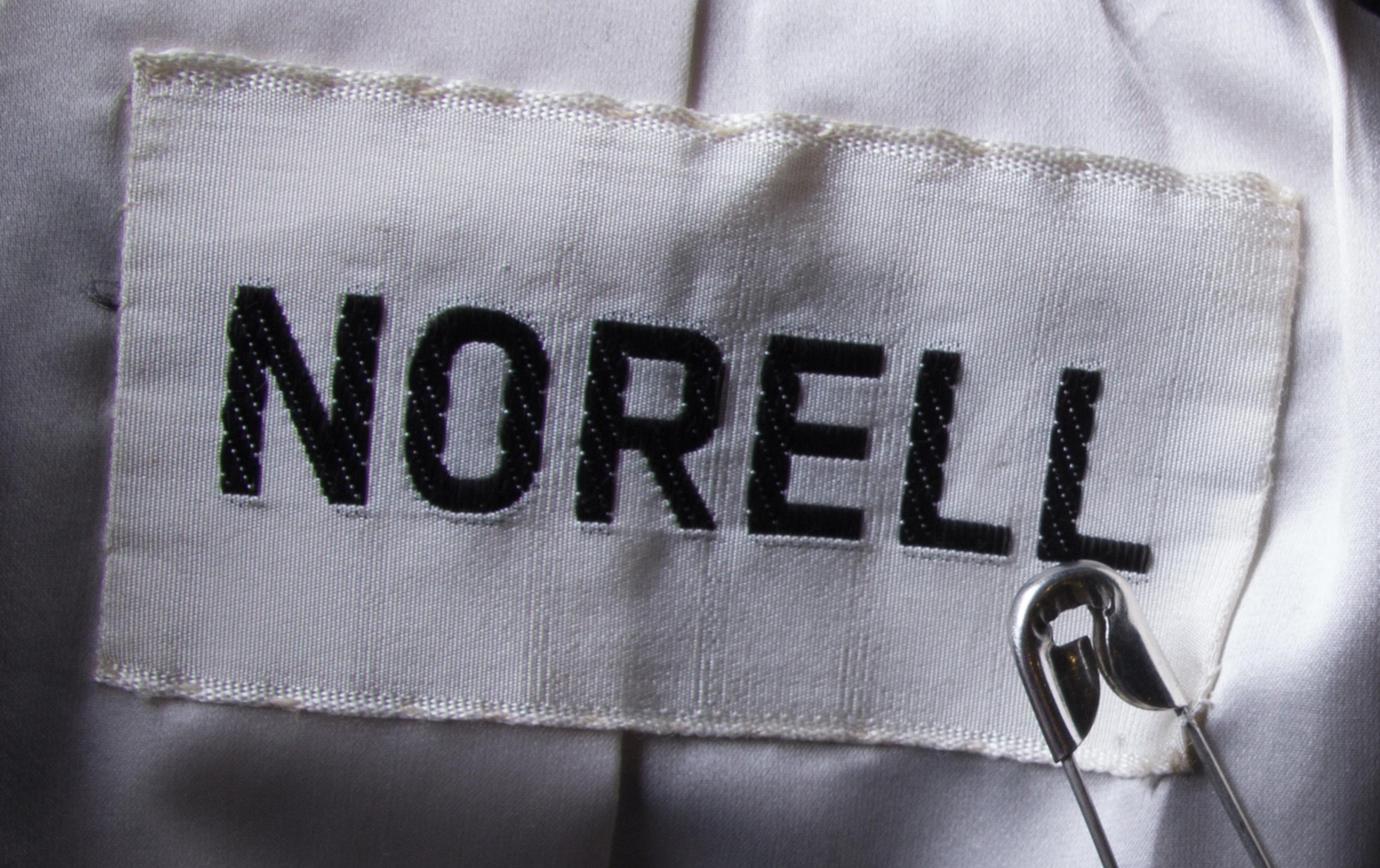 A Norell Black Wool Skirt Suit,
