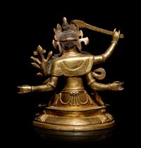 A Sino-Tibetan Gilt Bronze Figure of Manjushri