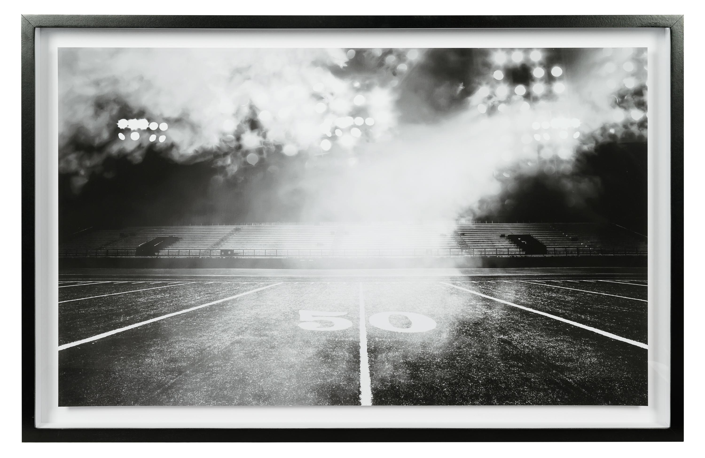 A Group of Four Framed Photographs