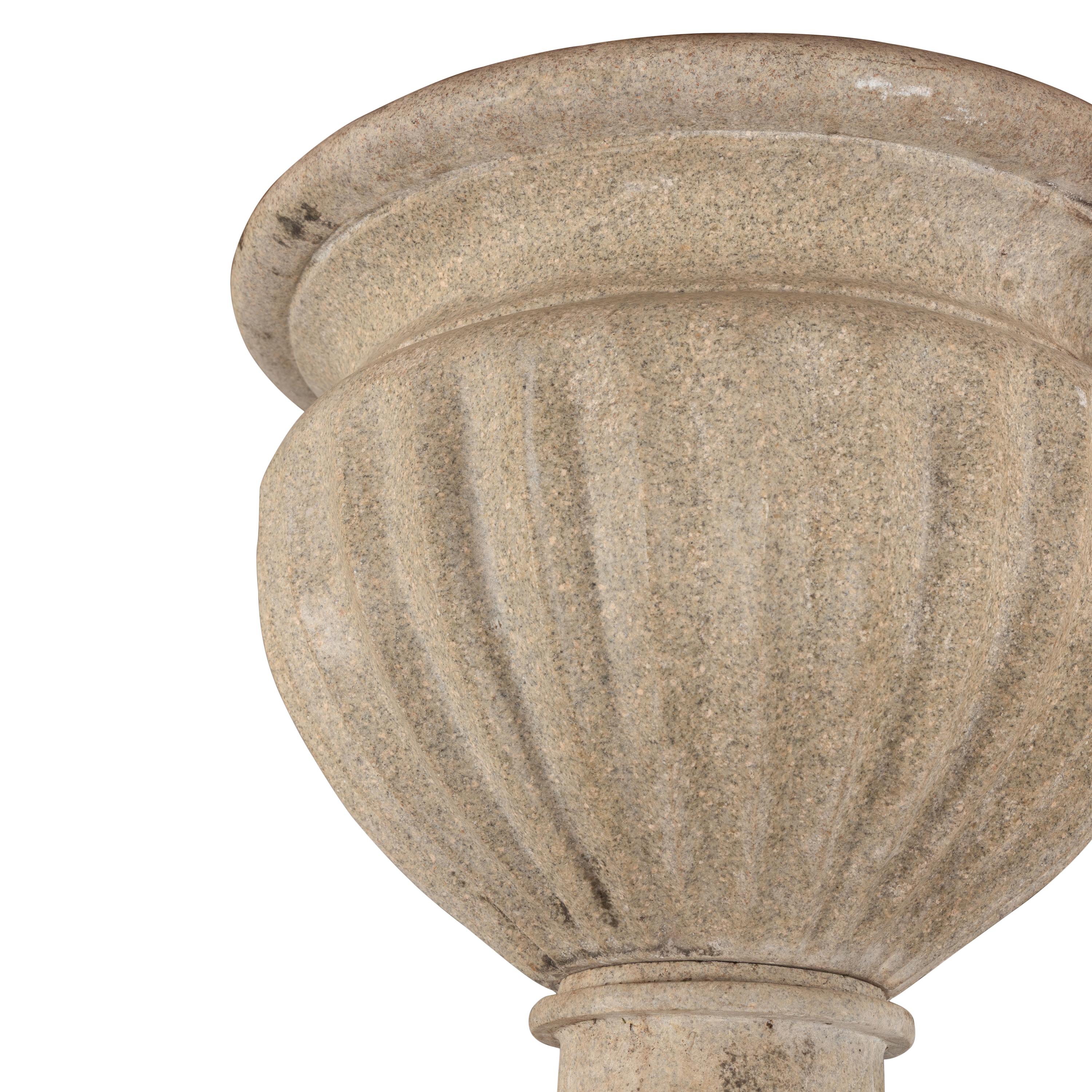 A Pair of Granite Garden Urns