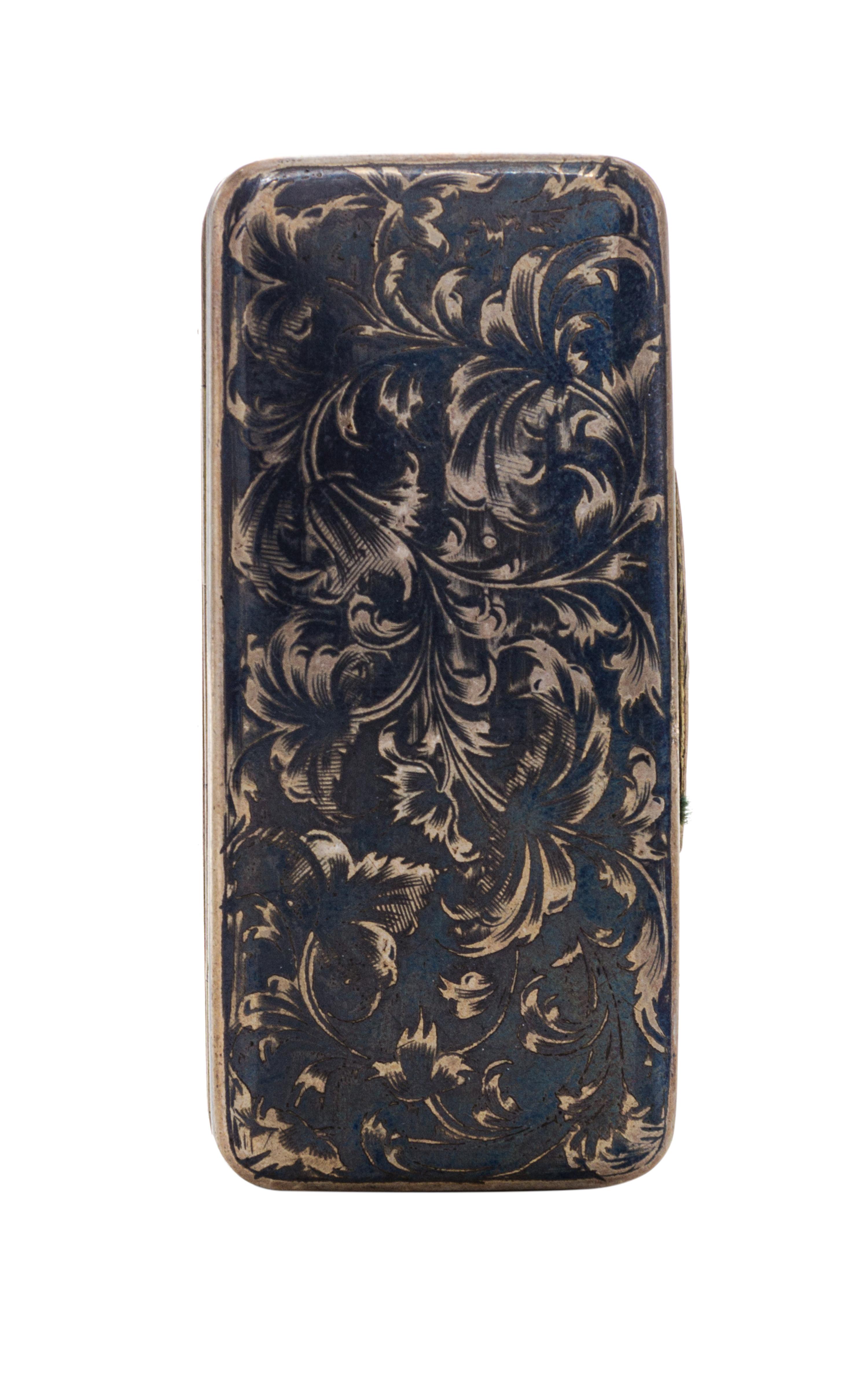 A Russian Niello Silver Snuff Box, Moscow, 19th Century, of rectangular form with floral scroll decoration.