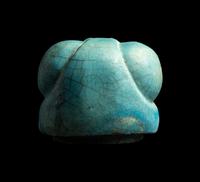 An Egyptian Blue Faience Canopic Jar Lid with the Head of a Baboon (Hapi)