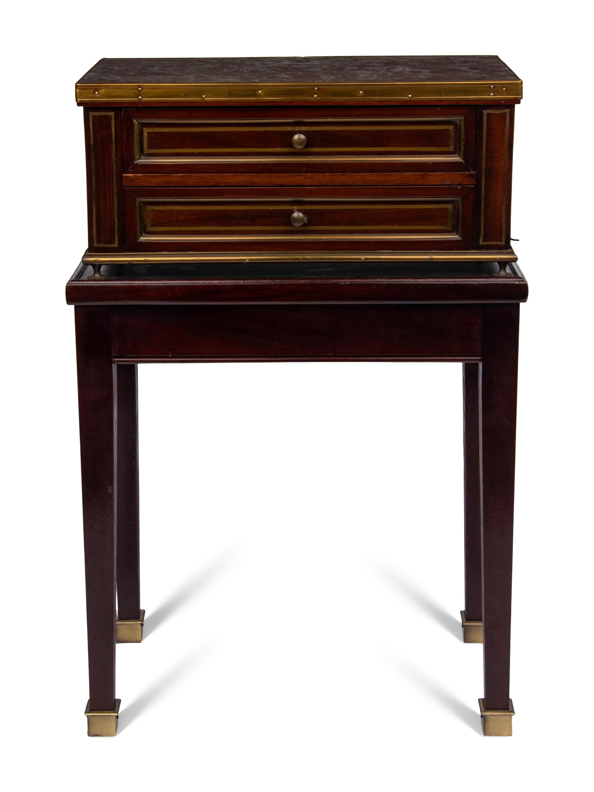 A Directoire Style Mahogany Marble-Top Chest on a Stand