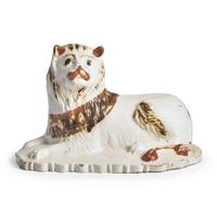 A Creamware Figure of a Seated Lion
