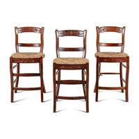A Set of Three Rustic Counter Stools