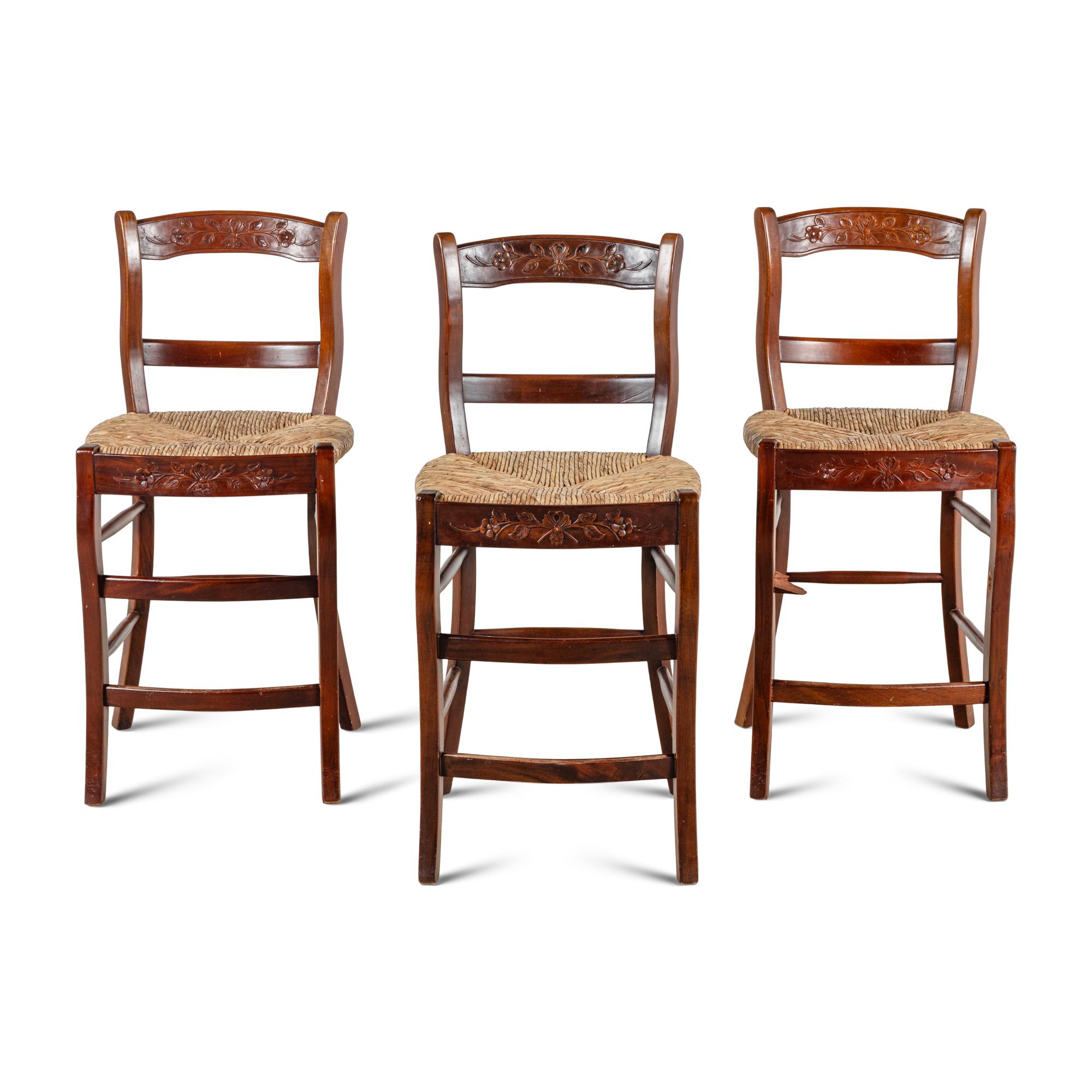 A Set of Three Rustic Counter Stools