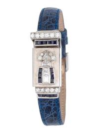 BULOVA, WHITE GOLD, DIAMOND AND SAPPHIRE SURPRISE WRISTWATCH