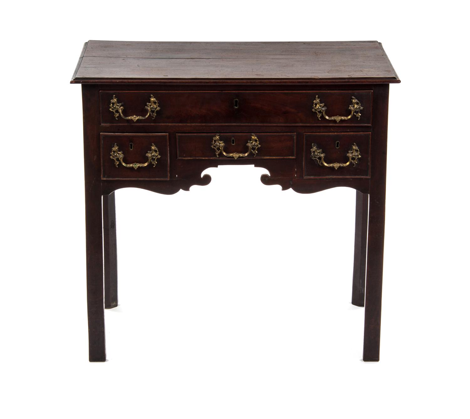 An English Mahogany Writing Desk, Height 30 1/2 x width 32 1/2 x depth 19 3/4 inches.