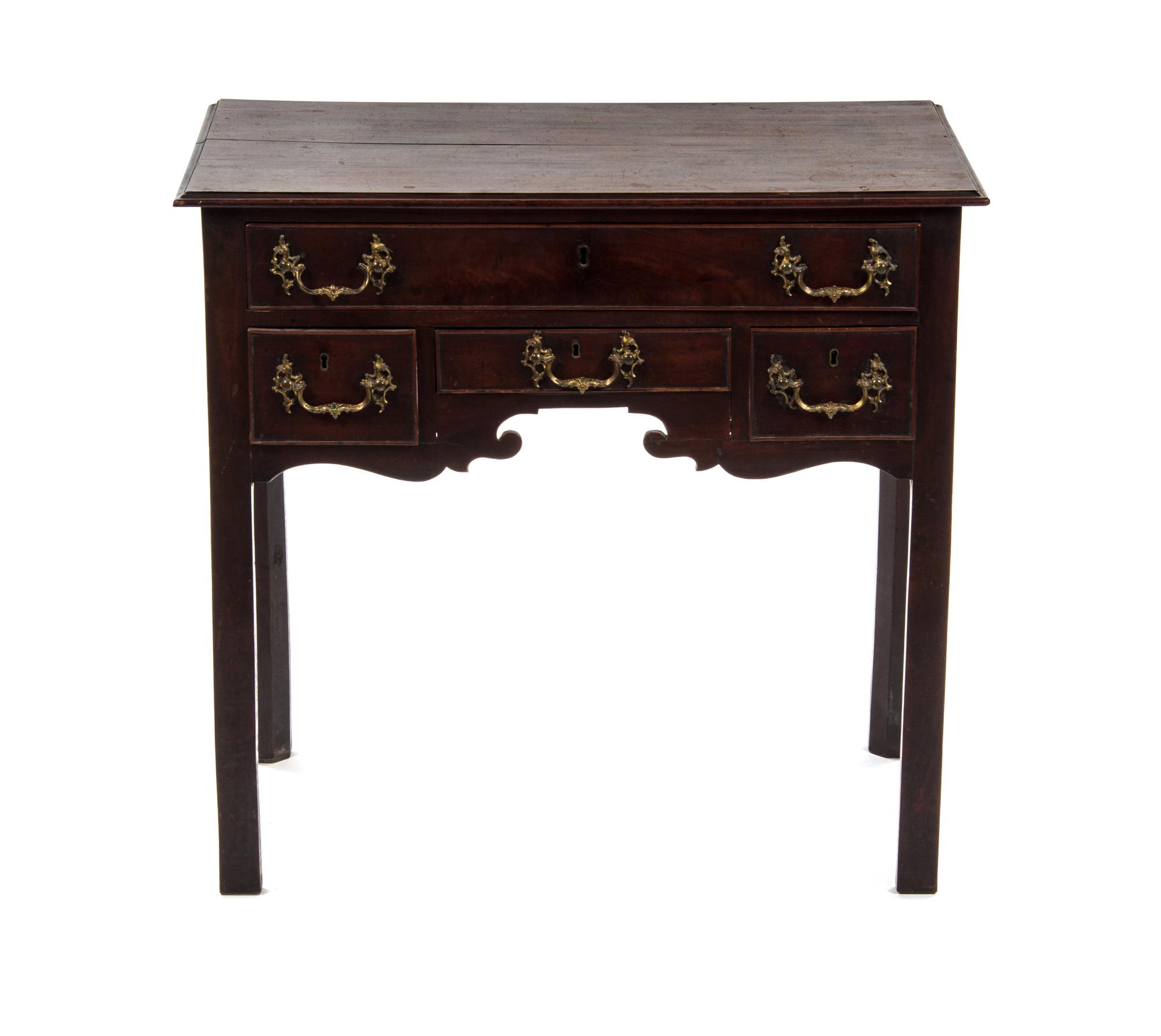 An English Mahogany Writing Desk, Height 30 1/2 x width 32 1/2 x depth 19 3/4 inches.