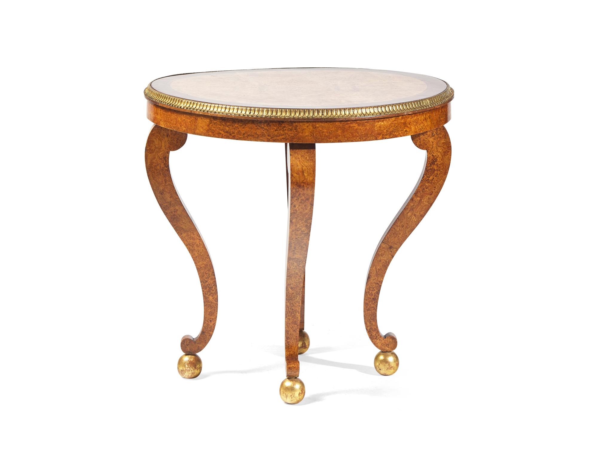 A Charles X Amboyna, Rosewood and Gilt-Bronze Mounted Occasional Table