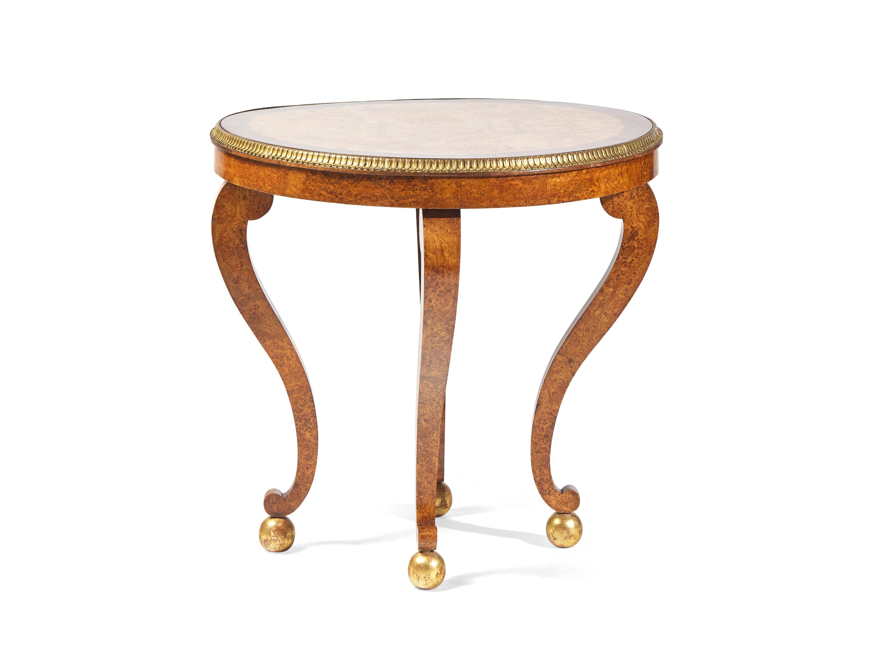 A Charles X Amboyna, Rosewood and Gilt-Bronze Mounted Occasional Table