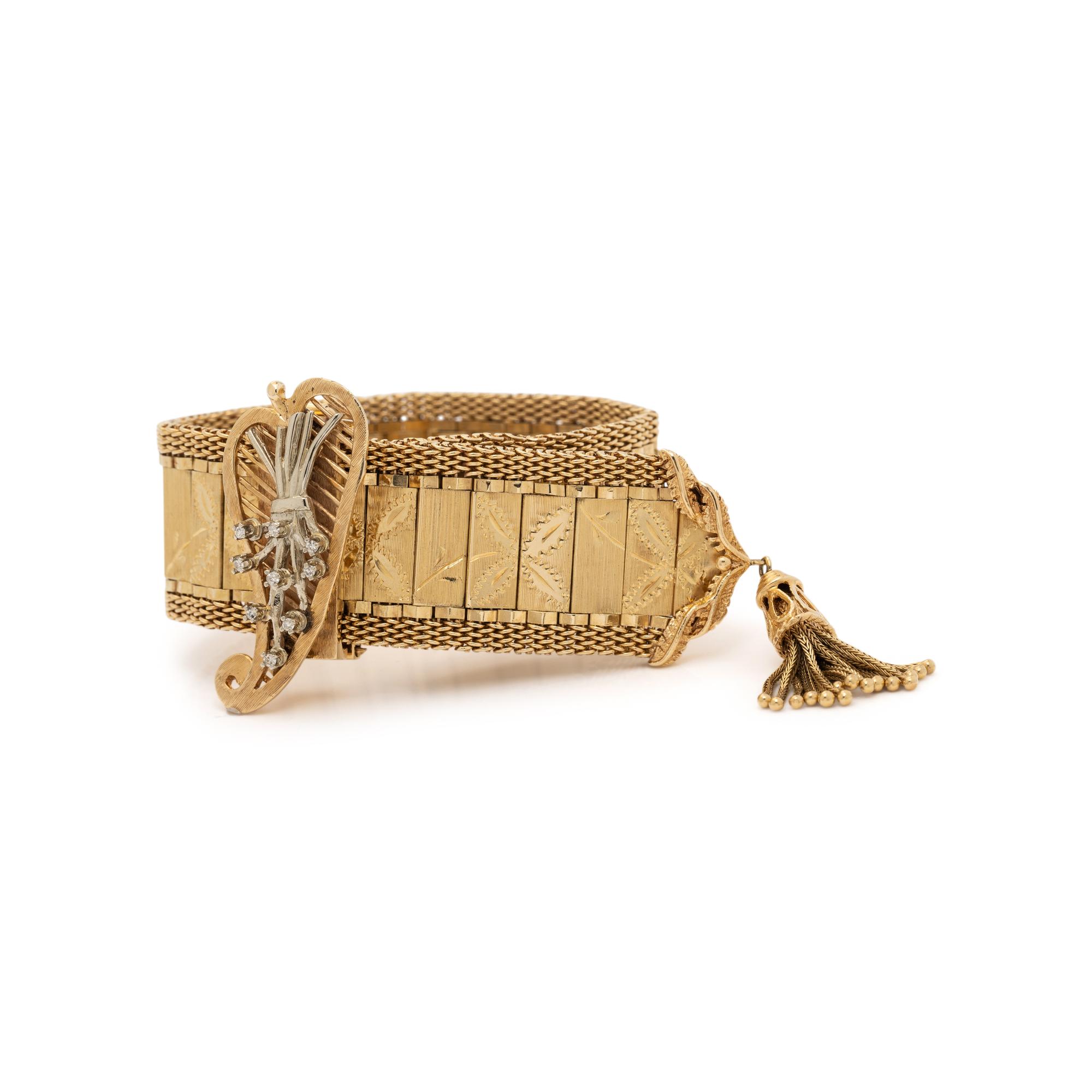 YELLOW GOLD AND DIAMOND SURPRISE WATCH