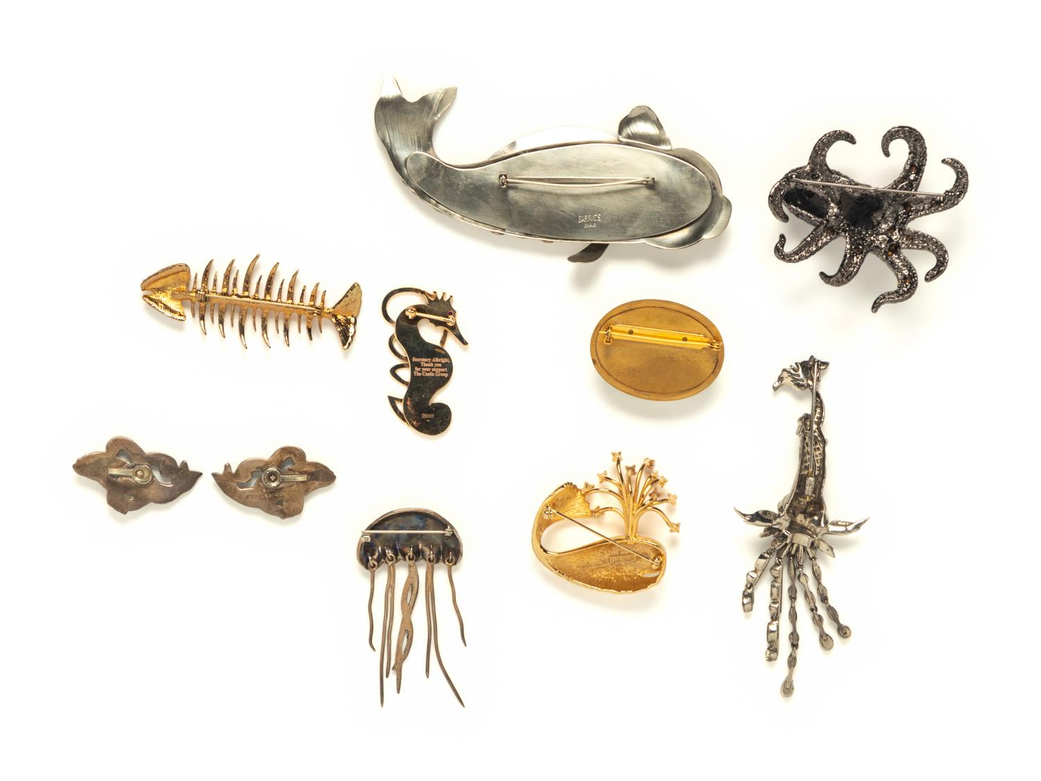 EIGHT MARINE LIFE BROOCHES AND A PAIR OF EAR CLIPS