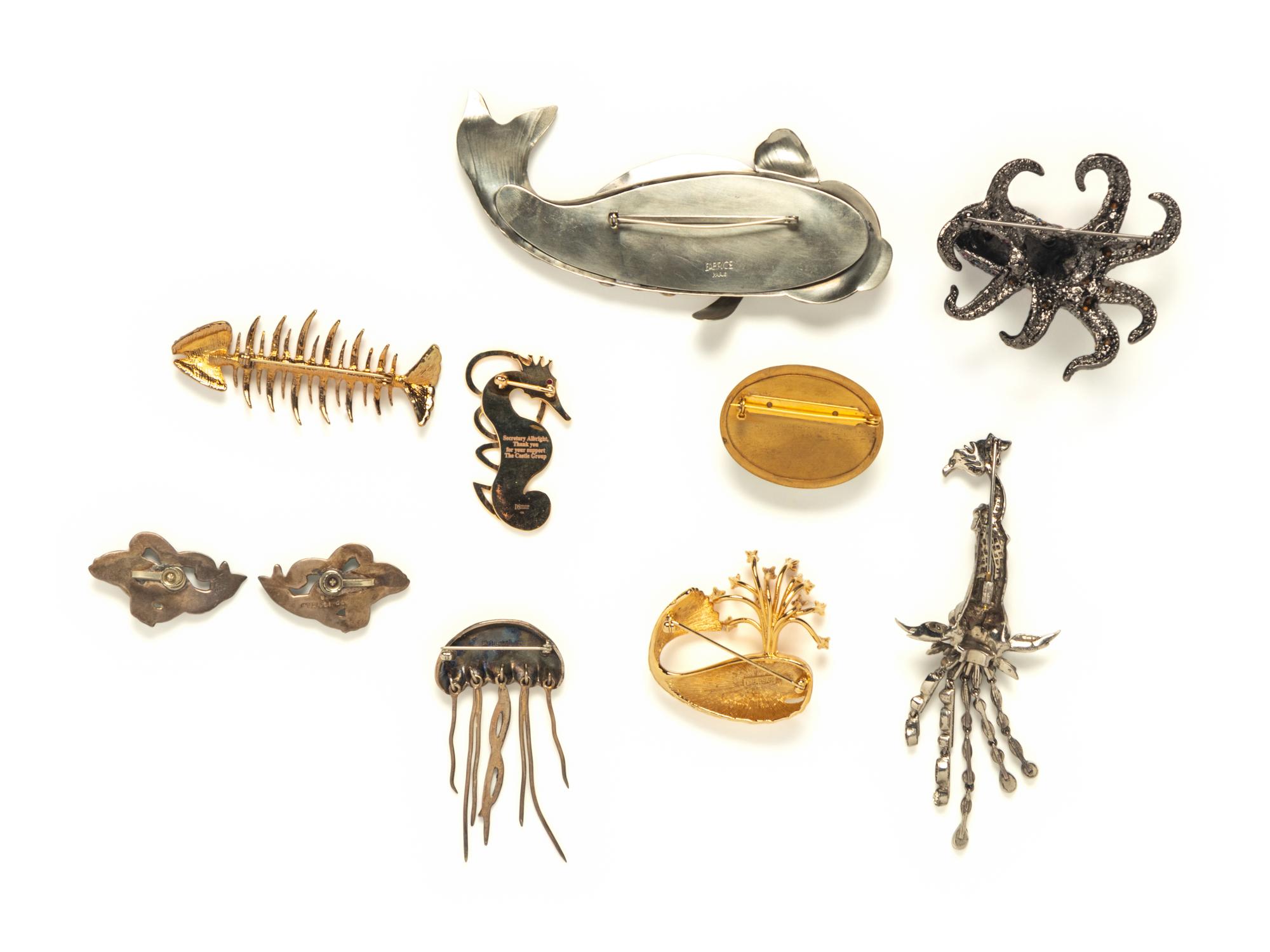EIGHT MARINE LIFE BROOCHES AND A PAIR OF EAR CLIPS